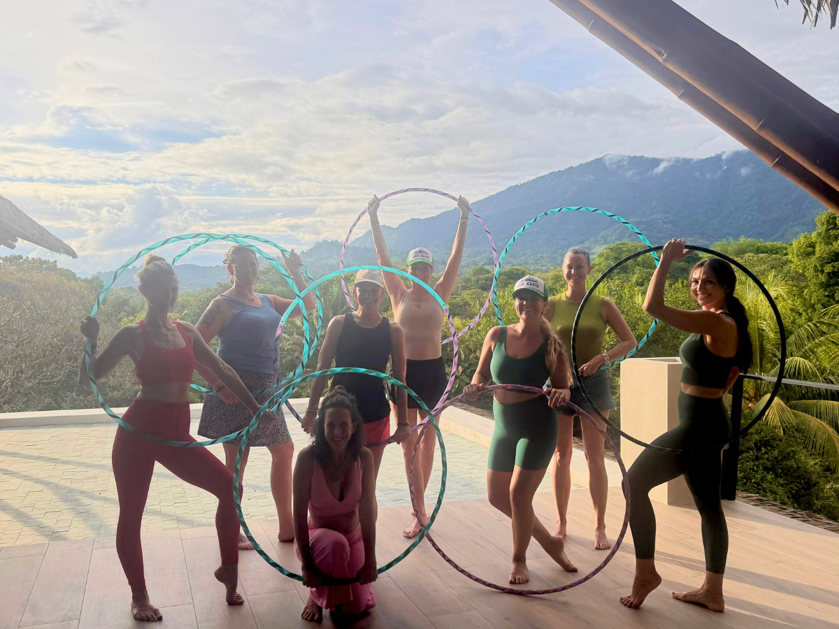 Women hula hoop class on retreat in Costa Rica